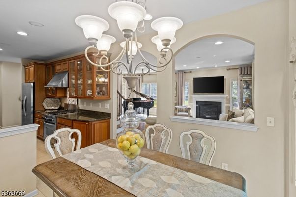 Chandelier, Dining room, Fireplace, Interior, Kitchen, Piano, Recessed Lighting