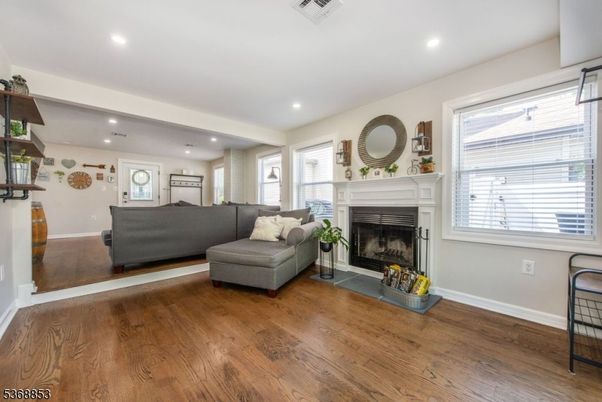 Fireplace, Interior, Living room, Recessed Lighting, Wood Texture Flooring
