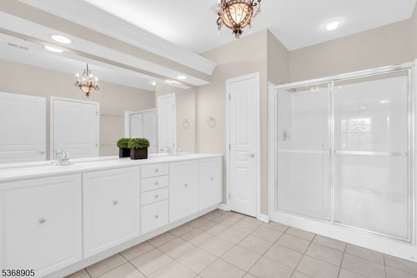 Bathroom, Chandelier, Dual Sink Vanities, Glass Shower, Interior, Recessed Lighting