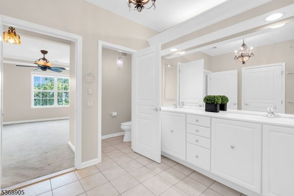Bathroom, Chandelier, Dual Sink Vanities, Interior, Recessed Lighting