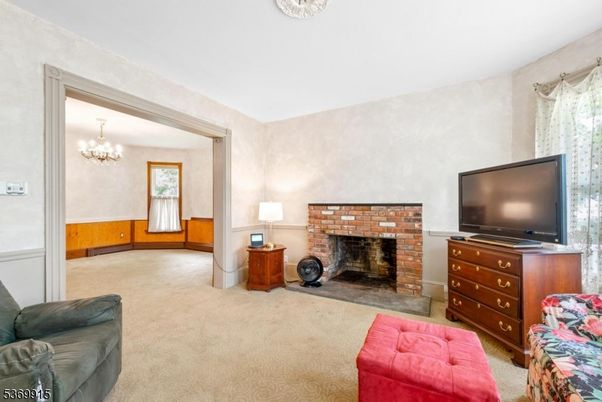 Chandelier, Fireplace, Interior, Living room