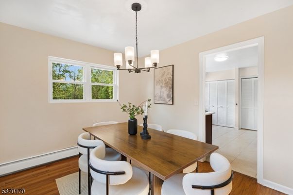 Chandelier, Dining room, Interior, Wood Texture Flooring