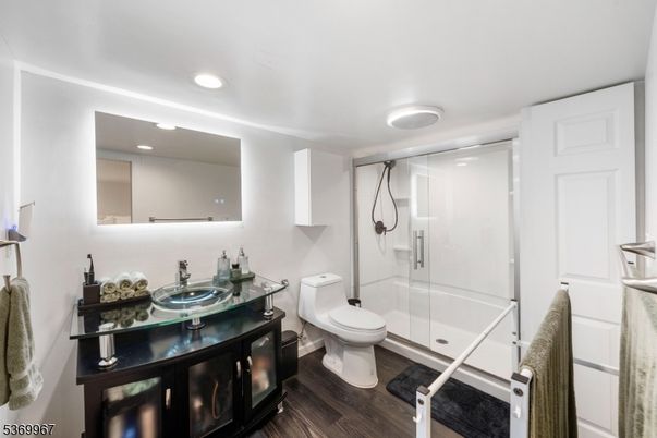 Bathroom, Glass Shower, Interior, Recessed Lighting, Wood Texture Flooring