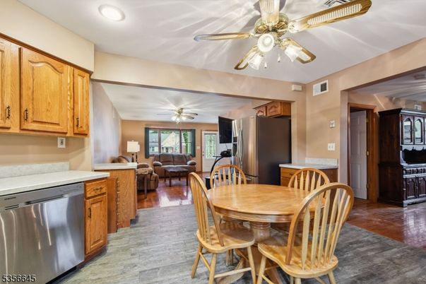 Dining room, Interior, Kitchen, Recessed Lighting, Stainless Steel Appliances, Wood Texture Flooring
