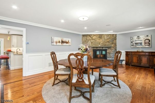 Dining room, Fireplace, Interior, Recessed Lighting, Wood Texture Flooring