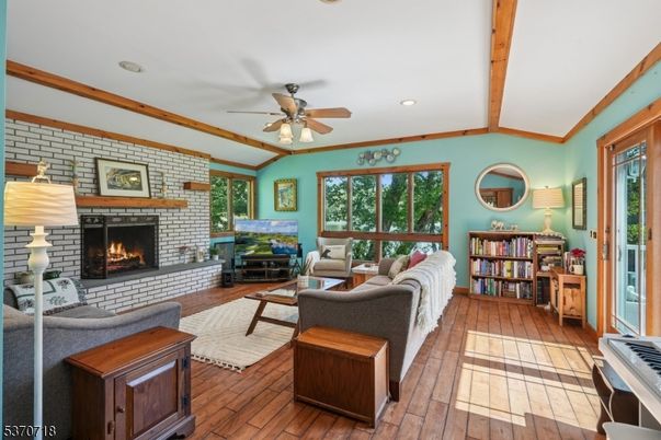 Fireplace, Interior, Living room, Recessed Lighting, Stone Walls, Wooden Beams, Wood Texture Flooring