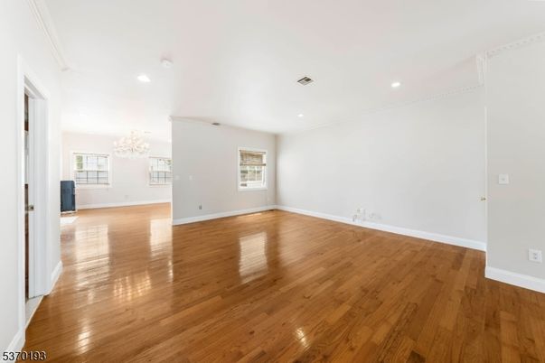 Chandelier, Empty room, Interior, Recessed Lighting, Wood Texture Flooring