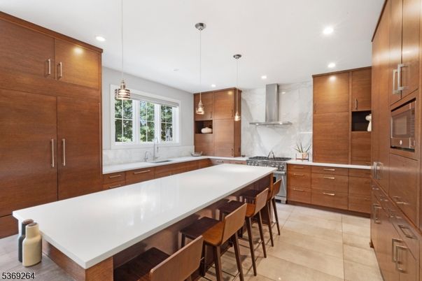 Interior, Kitchen, Marble Walls, Pendant Lights, Recessed Lighting, Stainless Steel Appliances