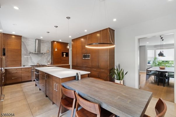 Dining room, Interior, Kitchen, Marble Walls, Pendant Lights, Recessed Lighting, Stainless Steel Appliances