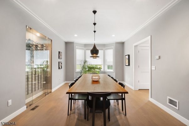 Dining room, Interior, Pendant Lights, Recessed Lighting, Wood Texture Flooring