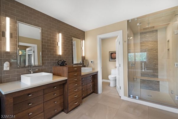 Bathroom, Dual Sink Vanities, Glass Shower, Interior, Stone Walls