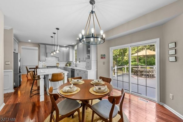 Chandelier, Dining room, Interior, Kitchen, Pendant Lights, Recessed Lighting, Wood Texture Flooring