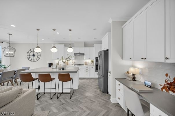 Dining room, Interior, Kitchen, Pendant Lights, Recessed Lighting, Stainless Steel Appliances, Wood Texture Flooring