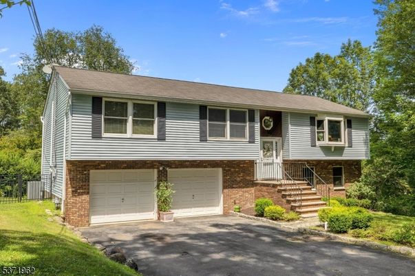 Attached, Exterior, Facade, Brick Facade, Raised Ranch