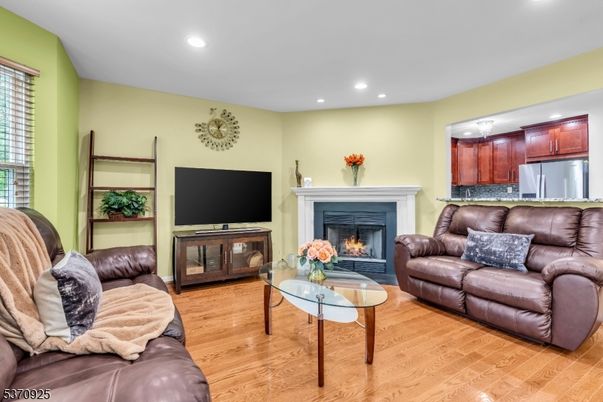 Fireplace, Interior, Living room, Recessed Lighting, Wood Texture Flooring
