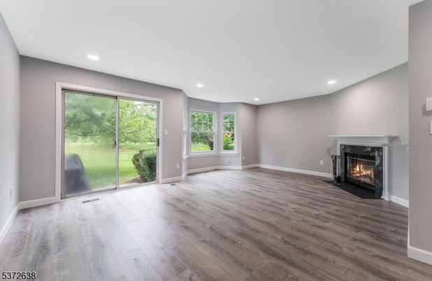 Empty room, Fireplace, Interior, Recessed Lighting, Wood Texture Flooring