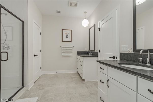 Bathroom, Dual Sink Vanities, Glass Shower, Interior, Pendant Lights