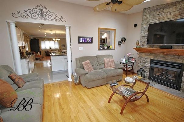 Dining room, Fireplace, Interior, Kitchen, Living room, Pendant Lights, Stone Walls, Wood Texture Flooring