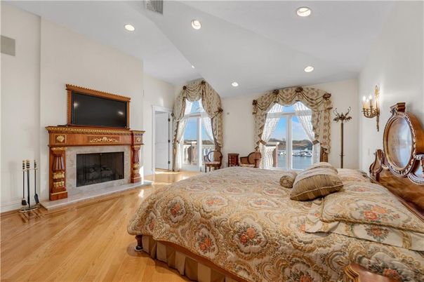 Bedroom, Fireplace, Interior, Recessed Lighting, Wood Texture Flooring