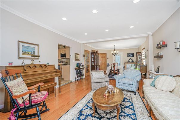 Chandelier, Dining room, Interior, Living room, Piano, Recessed Lighting, Wood Texture Flooring