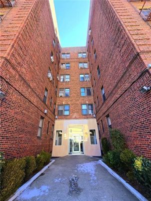 Exterior, Facade, Brick Facade, Condo Building