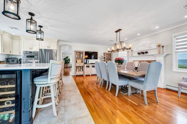 Dining room, Interior, Kitchen, Pendant Lights, Recessed Lighting, Stainless Steel Appliances, Wood Texture Flooring