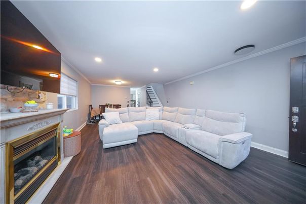 Fireplace, Interior, Kitchen, Living room, Recessed Lighting, Wood Texture Flooring