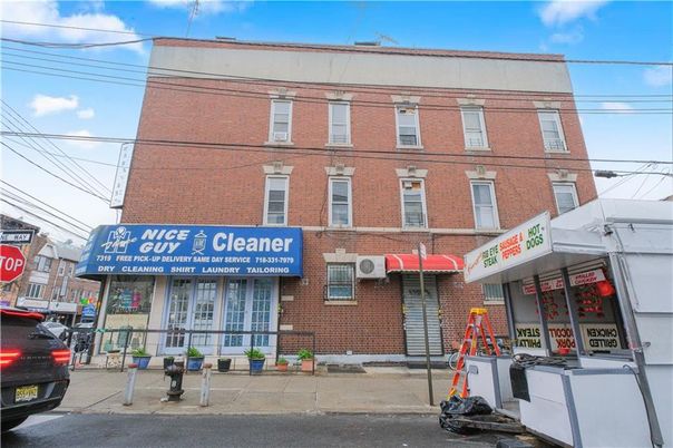 Exterior, Facade, Brick Facade, Condo Building