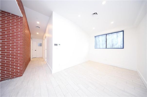 Empty room, Interior, Recessed Lighting, Stone Walls, Wood Texture Flooring