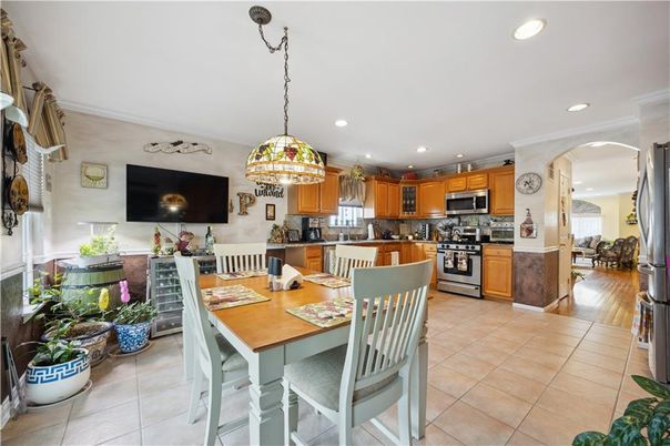 Dining room, Interior, Kitchen, Living room, Pendant Lights, Recessed Lighting, Stainless Steel Appliances, Wood Texture Flooring
