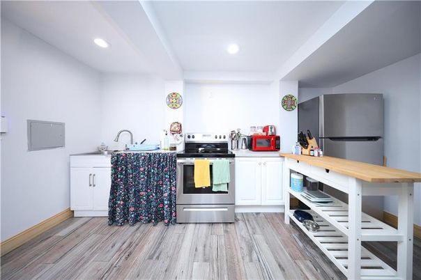 Interior, Kitchen, Recessed Lighting, Stainless Steel Appliances, Wood Texture Flooring