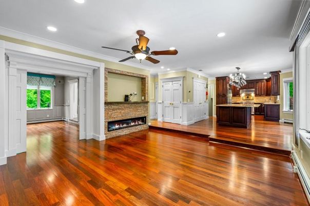 Chandelier, Empty room, Fireplace, Interior, Kitchen, Recessed Lighting, Wood Texture Flooring