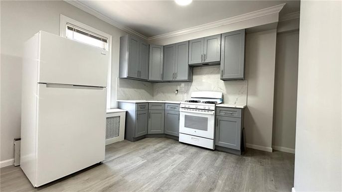 Interior, Kitchen, Marble Walls, Recessed Lighting, Wood Texture Flooring