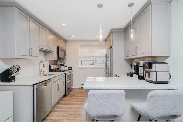 Interior, Kitchen, Pendant Lights, Recessed Lighting, Stainless Steel Appliances, Wood Texture Flooring