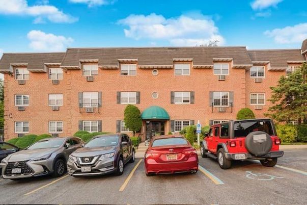 Exterior, Facade, Brick Facade, Condo Building
