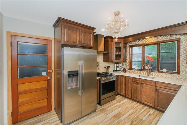Chandelier, Interior, Kitchen, Recessed Lighting, Stainless Steel Appliances, Wood Texture Flooring