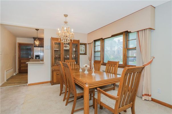 Chandelier, Dining room, Interior, Kitchen, Stainless Steel Appliances, Wood Texture Flooring