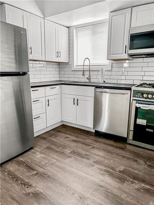 Interior, Kitchen, Stainless Steel Appliances, Wood Texture Flooring
