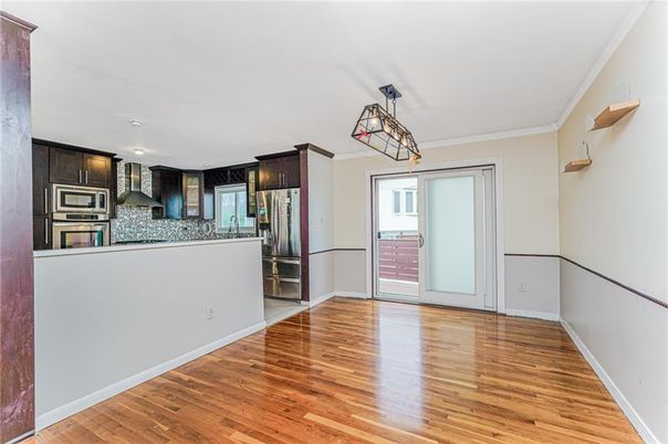 Empty room, Interior, Kitchen, Stainless Steel Appliances, Wood Texture Flooring