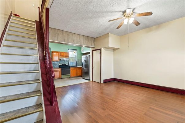 Empty room, Interior, Kitchen, Stainless Steel Appliances, Wood Texture Flooring