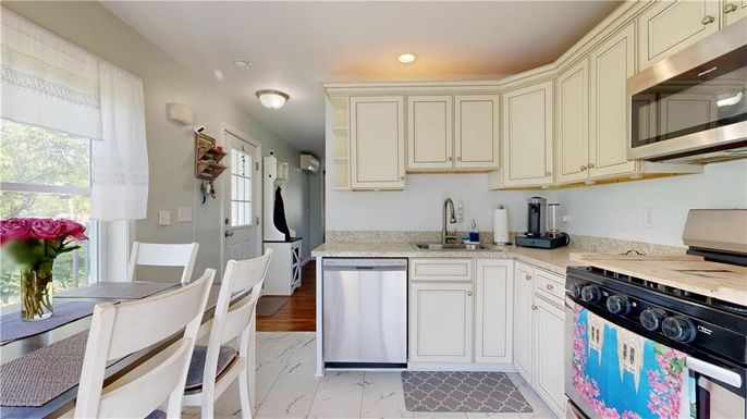 Dining room, Interior, Kitchen, Recessed Lighting, Stainless Steel Appliances, Wood Texture Flooring