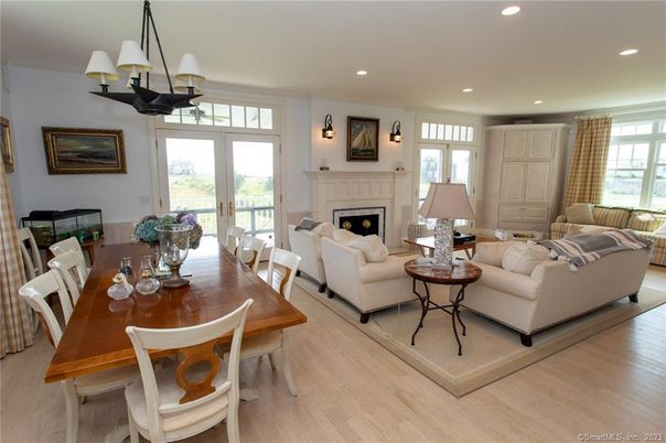 Chandelier, Dining room, Fireplace, Interior, Living room, Recessed Lighting, Wood Texture Flooring