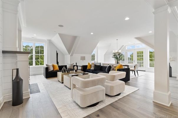 Dining room, Fireplace, Interior, Living room, Pendant Lights, Recessed Lighting, Wood Texture Flooring