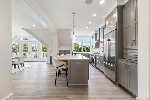 Dining room, Interior, Kitchen, Pendant Lights, Recessed Lighting, Stainless Steel Appliances, Wood Texture Flooring