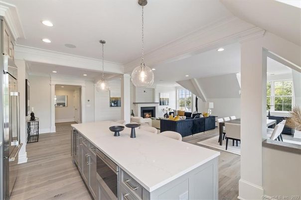 Dining room, Fireplace, Interior, Kitchen, Living room, Pendant Lights, Recessed Lighting, Wood Texture Flooring