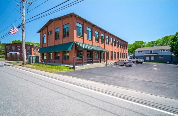 Exterior, Facade, Brick Facade, Condo Building