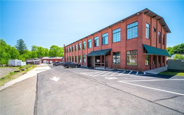 Exterior, Facade, Brick Facade, Condo Building