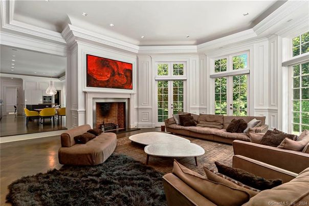 Dining room, Fireplace, Interior, Living room, Recessed Lighting, Wood Texture Flooring
