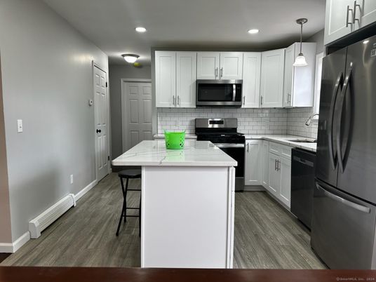 Interior, Kitchen, Pendant Lights, Recessed Lighting, Stainless Steel Appliances, Wood Texture Flooring