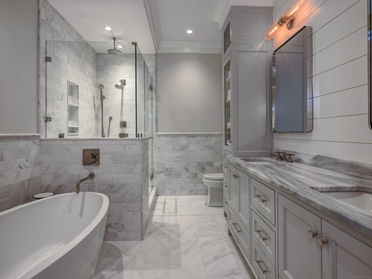 Bathroom, Dual Sink Vanities, Free Standing Baths, Glass Shower, Interior, Marble, Marble Walls, Recessed Lighting